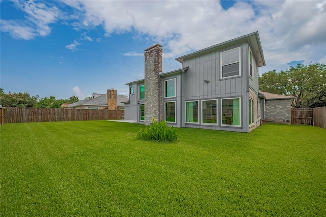 1709 Coles Farm Dr, Sugar Land, TX 77478 - back of property with a chimney