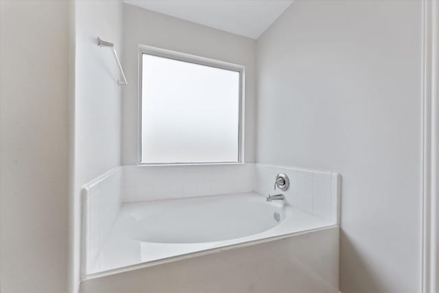 full bathroom featuring a garden tub