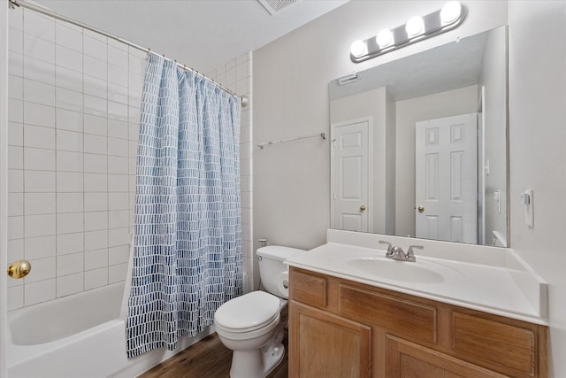 bathroom with toilet, shower / bathtub combination with curtain, vanity, and wood finished floors
