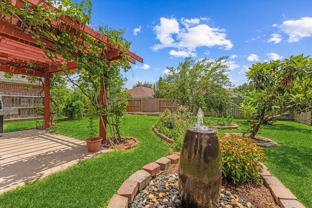 view of yard featuring a pergola and a patio area
