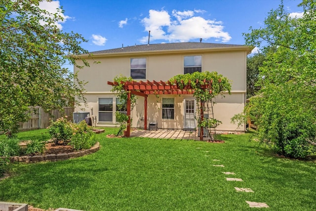 back of house featuring a pergola, a patio, and stucco siding