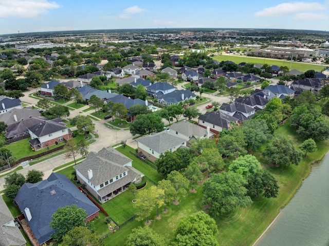 2712 Park Falls Dr, Pearland, TX 77584 - aerial overview of property's location with nearby suburban area and a nearby body of water