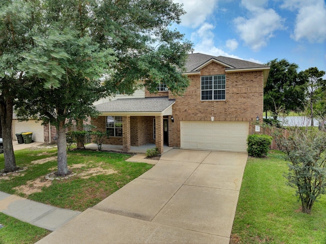 2712 Park Falls Dr, Pearland, TX 77584 - view of front of house with brick siding, an attached garage, driveway, and a shingled roof