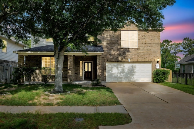2712 Park Falls Dr, Pearland, TX 77584 - view of front facade featuring fence, an attached garage, concrete driveway, and brick siding