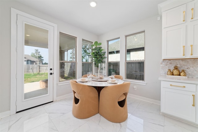18114 Harbor Trail Ln, Conroe, TX 77302 - dining area featuring plenty of natural light, recessed lighting, marble finish floor, and baseboards