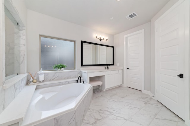 18114 Harbor Trail Ln, Conroe, TX 77302 - bathroom featuring vanity, a garden tub, marble finish floor, and visible vents