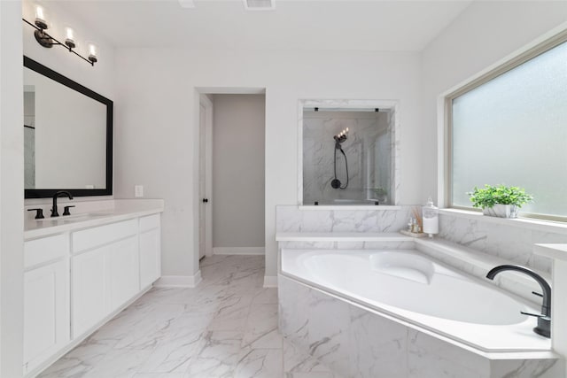 18114 Harbor Trail Ln, Conroe, TX 77302 - full bathroom with vanity, visible vents, marble finish floor, a bath, and a marble finish shower