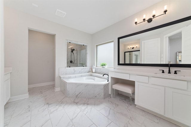 18114 Harbor Trail Ln, Conroe, TX 77302 - full bathroom featuring a garden tub, marble finish floor, a shower, and vanity