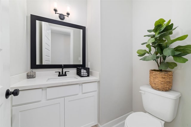 18114 Harbor Trail Ln, Conroe, TX 77302 - bathroom with vanity, baseboards, and toilet