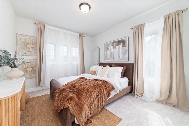 18114 Harbor Trail Ln, Conroe, TX 77302 - bedroom featuring light carpet