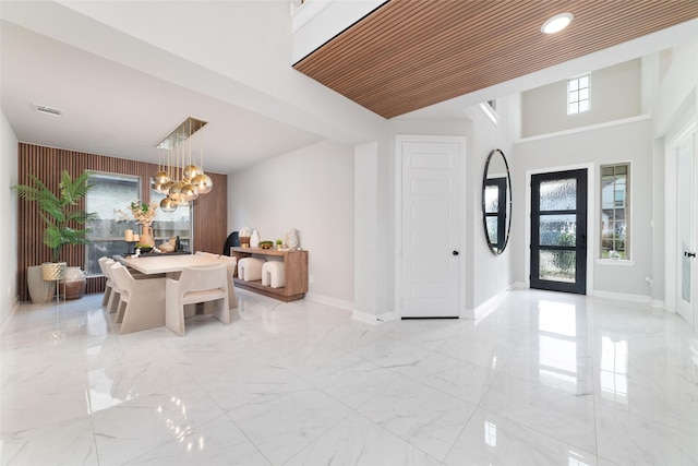 18114 Harbor Trail Ln, Conroe, TX 77302 - entrance foyer with an inviting chandelier, baseboards, visible vents, and marble finish floor