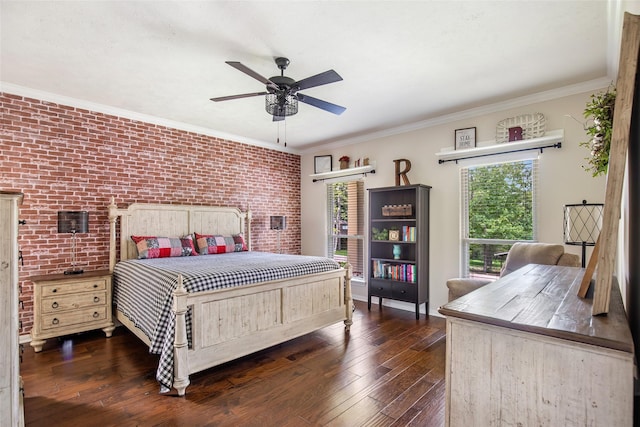 bedroom featuring dark wood-type flooring, a ceiling fan, crown molding, and brick wall
