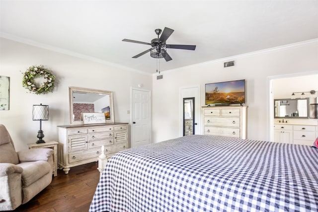 bedroom featuring visible vents, ornamental molding, ensuite bathroom, and dark wood-type flooring