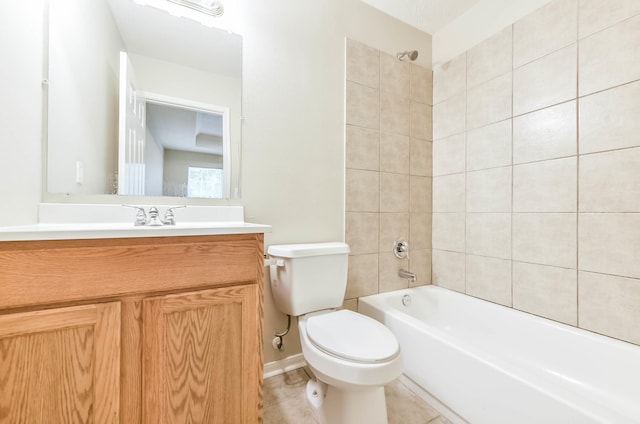 bathroom with tile patterned flooring, vanity, baseboards, toilet, and tub / shower combination