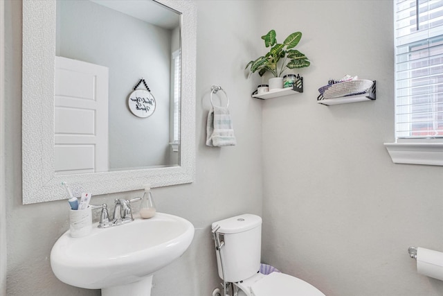 4418 Windflower Valley Ln, Katy, TX 77493 - half bath featuring a sink and toilet