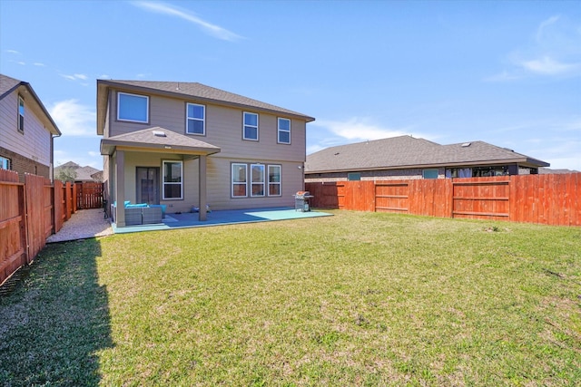4418 Windflower Valley Ln, Katy, TX 77493 - rear view of property featuring a patio area and an outdoor hangout area