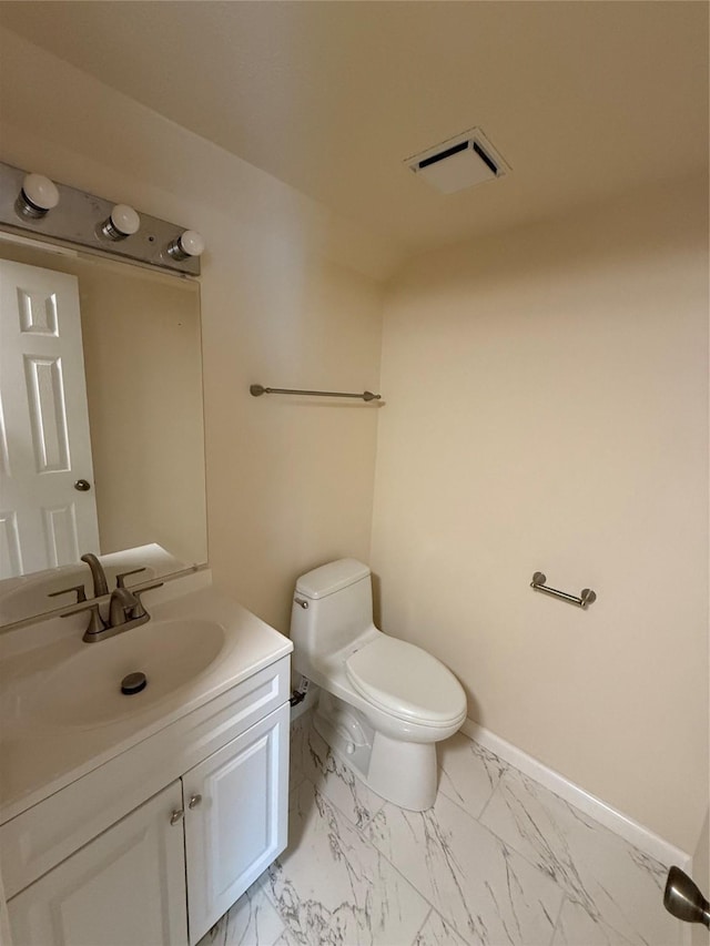 16319 Chimneystone Dr, Houston, TX 77095 - half bathroom featuring vanity, toilet, marble finish flooring, and baseboards
