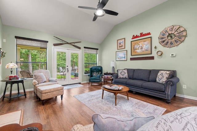 living room featuring french doors, baseboards, a ceiling fan, and wood finished floors