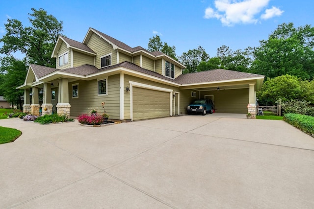 view of front of house with concrete driveway, a porch, roof with shingles, and a garage
