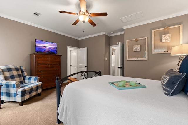 bedroom with visible vents, carpet flooring, crown molding, and a ceiling fan