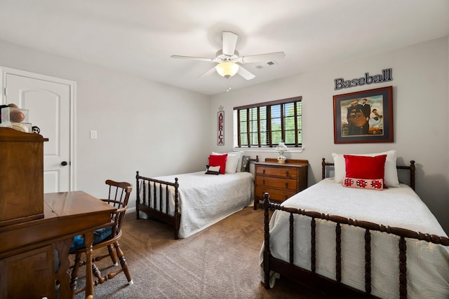 bedroom with carpet floors, a ceiling fan, and visible vents