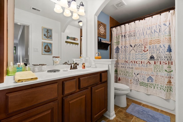 bathroom featuring toilet, tile patterned floors, visible vents, and vanity