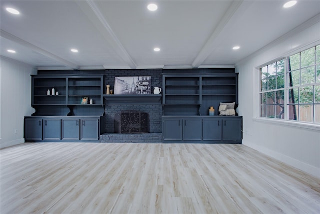 1719 Wagon Gap Trl, Houston, TX 77090 - unfurnished living room featuring beamed ceiling, baseboards, wood finished floors, recessed lighting, and a brick fireplace