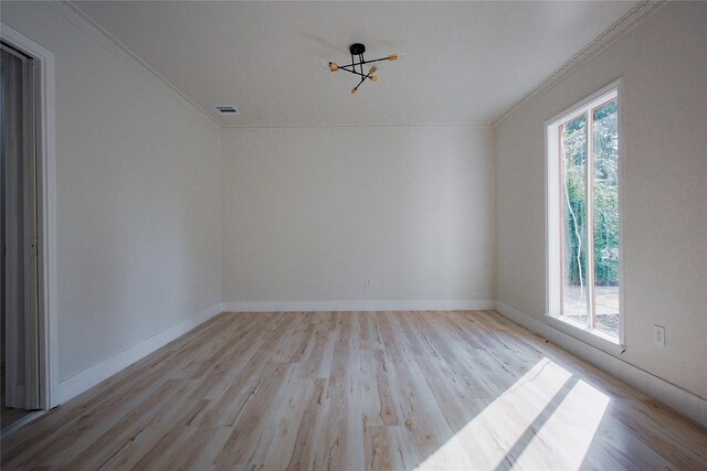 1719 Wagon Gap Trl, Houston, TX 77090 - spare room featuring ornamental molding, wood finished floors, and baseboards