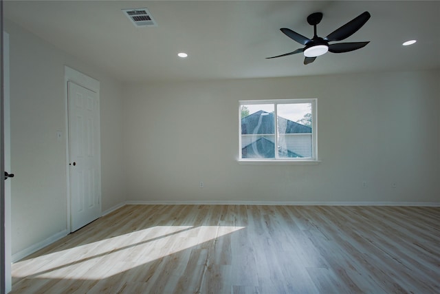 1719 Wagon Gap Trl, Houston, TX 77090 - empty room with wood finished floors, baseboards, a ceiling fan, and recessed lighting