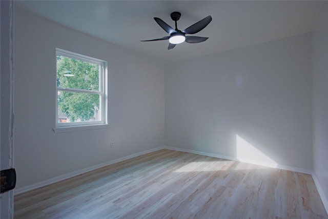 1719 Wagon Gap Trl, Houston, TX 77090 - unfurnished room featuring light wood-type flooring, baseboards, and ceiling fan