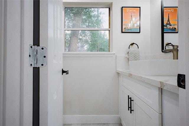 1719 Wagon Gap Trl, Houston, TX 77090 - bathroom with baseboards and vanity