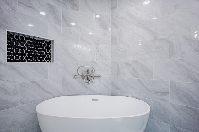 1719 Wagon Gap Trl, Houston, TX 77090 - full bath with tile walls and a freestanding bath