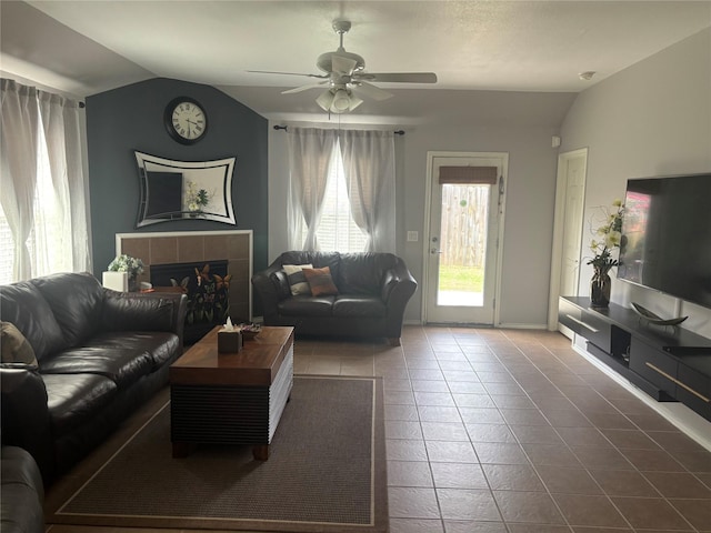 16427 Kettlebrook Ln, Houston, TX 77049 - tiled living room with a ceiling fan, baseboards, and lofted ceiling