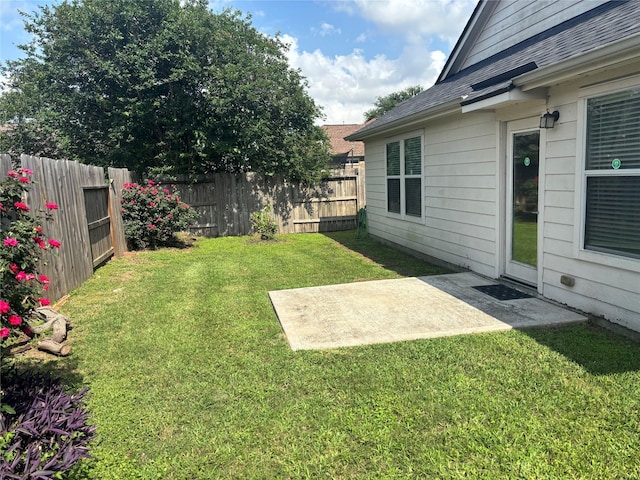 16427 Kettlebrook Ln, Houston, TX 77049 - view of yard featuring a fenced backyard and a patio area