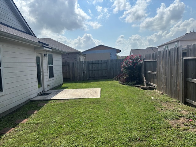 16427 Kettlebrook Ln, Houston, TX 77049 - view of yard featuring a fenced backyard and a patio
