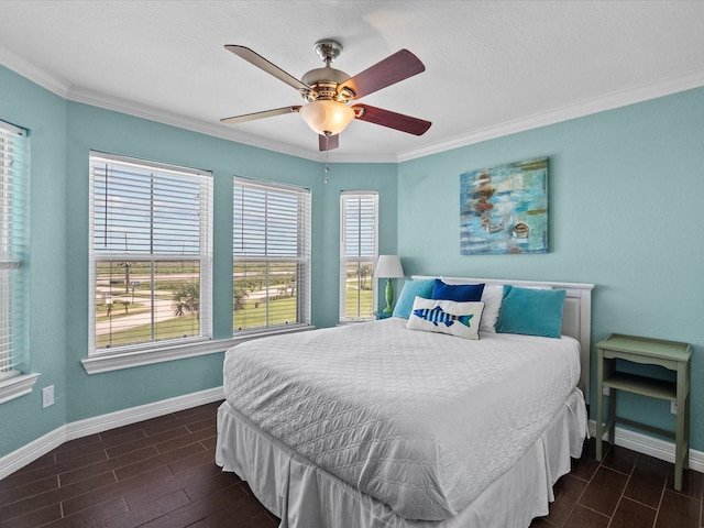 4035 Estuary Ct, Galveston, TX 77554 - bedroom with ornamental molding, baseboards, wood tiled floors, and ceiling fan