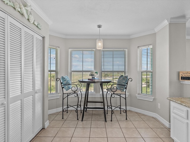 4035 Estuary Ct, Galveston, TX 77554 - dining space featuring plenty of natural light, baseboards, crown molding, and light tile patterned flooring