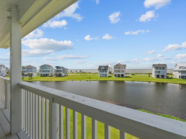 4035 Estuary Ct, Galveston, TX 77554 - balcony featuring a residential view and a water view