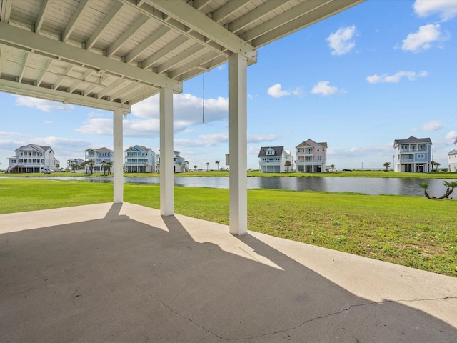 4035 Estuary Ct, Galveston, TX 77554 - view of patio / terrace featuring a water view and a residential view