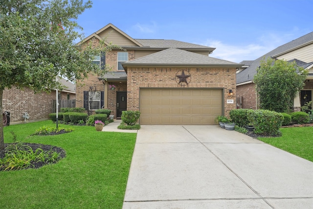 traditional-style home featuring brick siding, a garage, driveway, and a front lawn