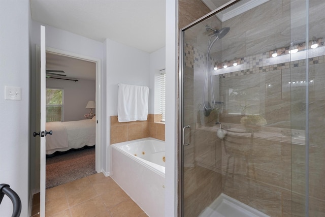 13935 Pueblo Run, Cypress, TX 77429 - ensuite bathroom featuring a jetted tub, tile patterned floors, a stall shower, and connected bathroom