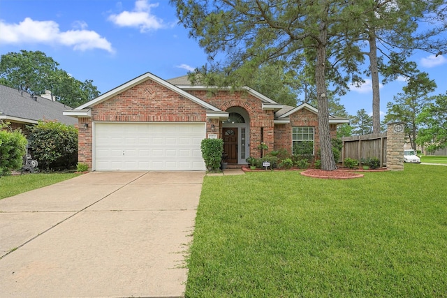 13935 Pueblo Run, Cypress, TX 77429 - view of front facade featuring brick siding, a front lawn, an attached garage, and driveway