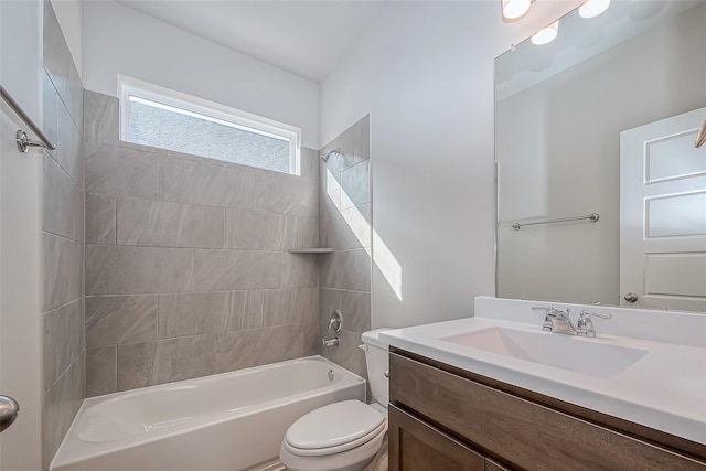 full bathroom featuring vanity, tub / shower combination, and toilet