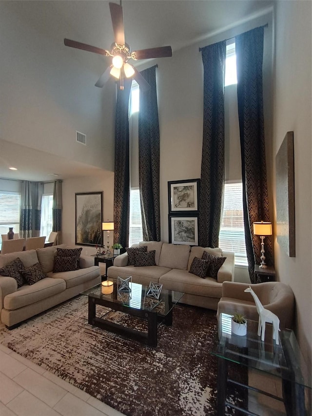 12303 Sterling Oak Dr, Humble, TX 77044 - tiled living area featuring a towering ceiling and ceiling fan