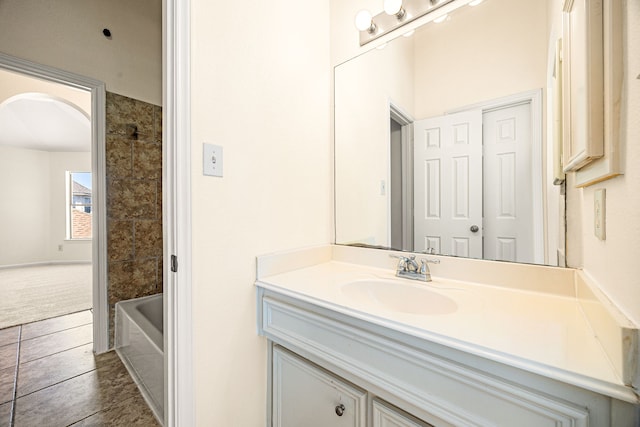 full bathroom with vanity and tile patterned floors