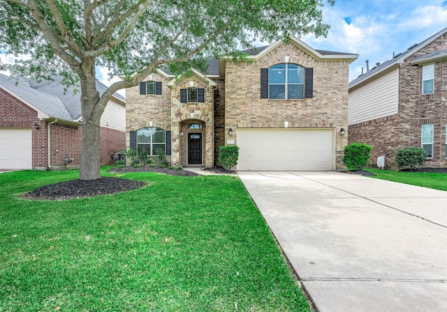8210 Silent Deep Dr, Rosenberg, TX 77469 - traditional home with a garage, a front yard, concrete driveway, and brick siding