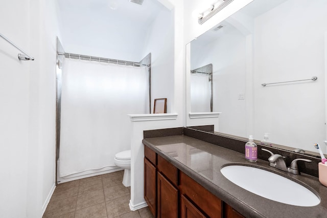 bathroom with toilet, a shower with curtain, visible vents, tile patterned flooring, and vanity