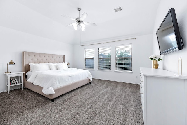 bedroom featuring baseboards, ceiling fan, visible vents, vaulted ceiling, and dark carpet