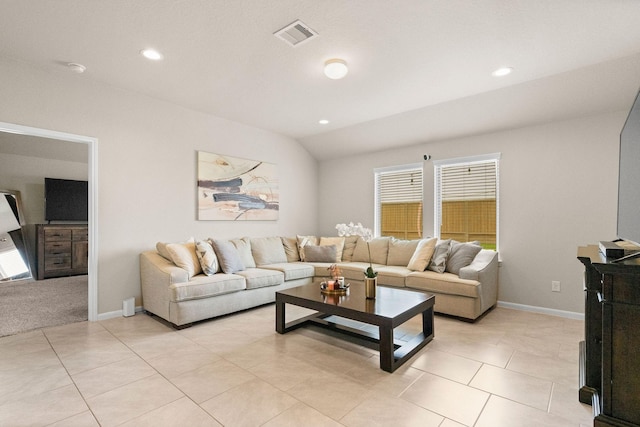 living room featuring vaulted ceiling, recessed lighting, and visible vents