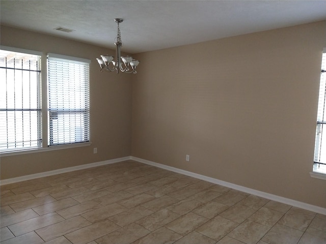811 Sweet Flower Dr, Houston, TX 77073 - spare room with plenty of natural light, a chandelier, and baseboards